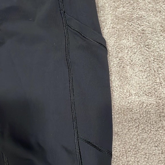 Size 2 Lululemon black pants with side pockets. - Picture 4 of 5